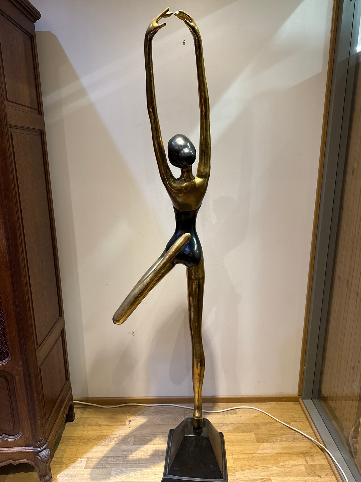 Bronze/brass statue. Height 185cm.