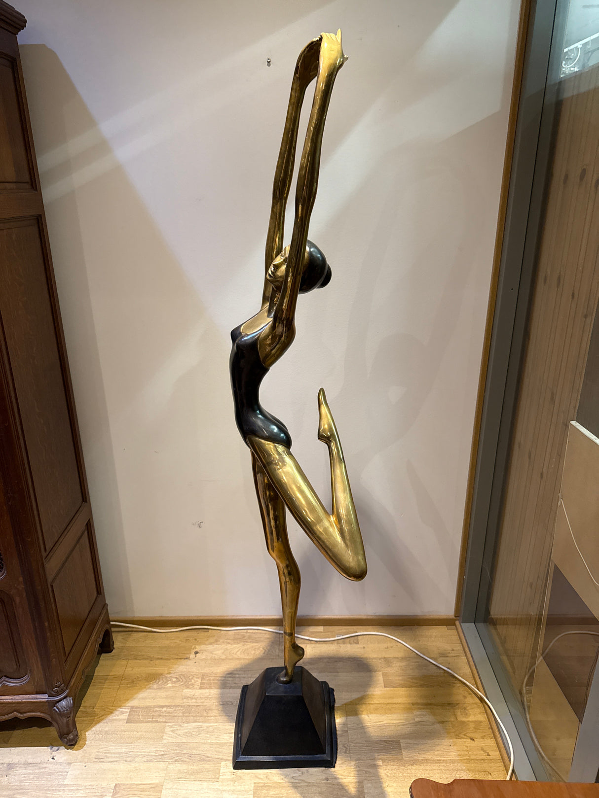 Bronze/brass statue. Height 185cm.