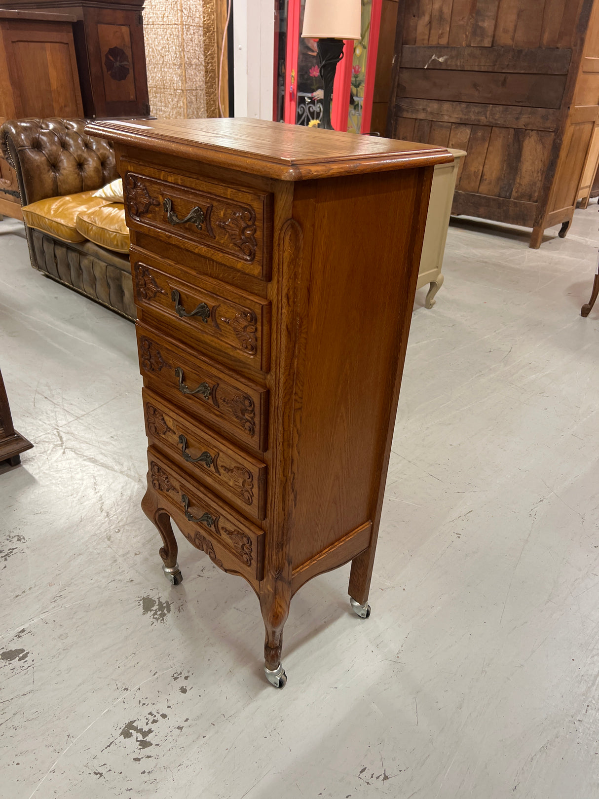 Rococo chest of drawers, W. 48cm, D. 33cm, H. 99cm (including wheels).
