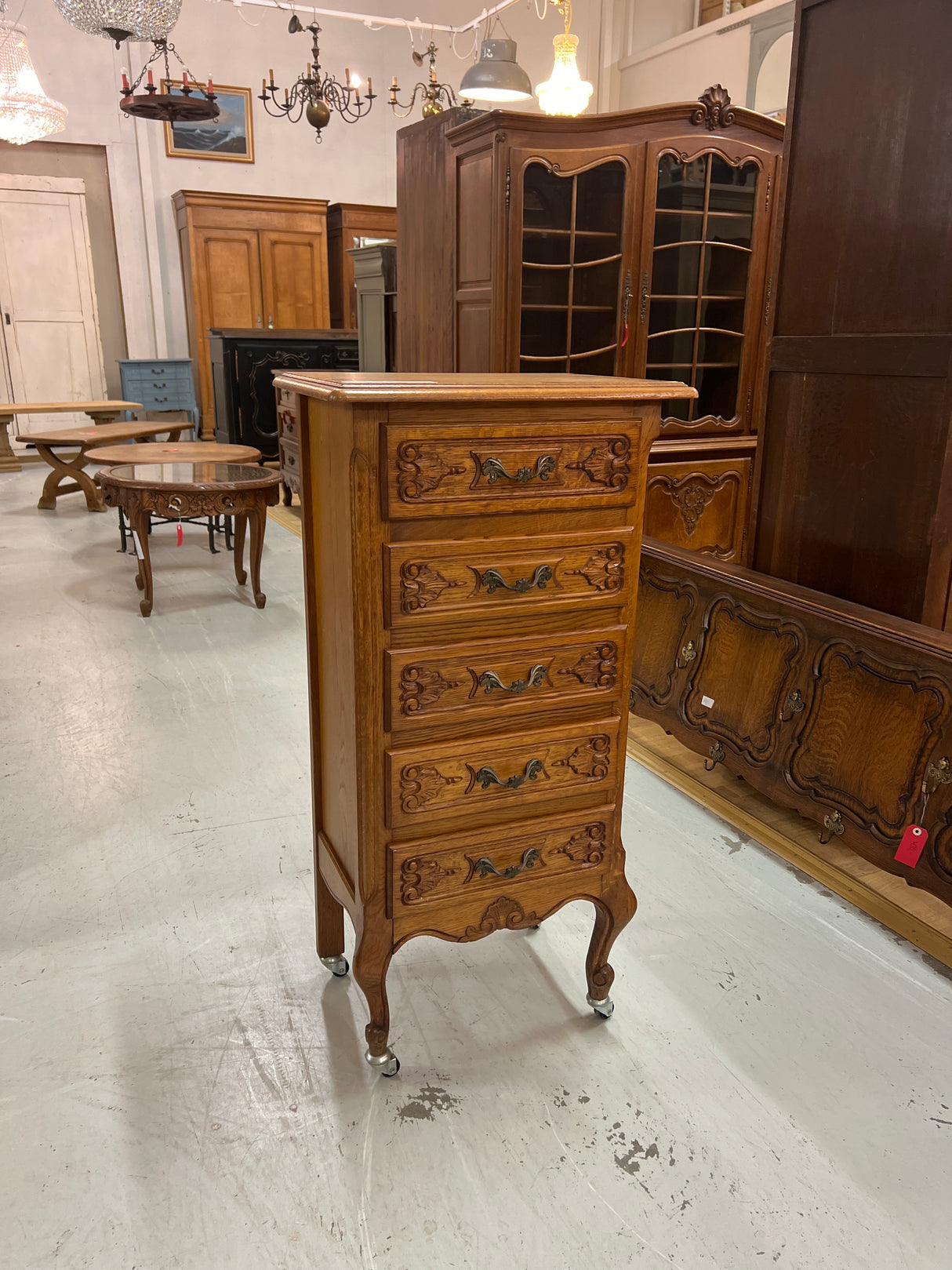 Rococo chest of drawers, W. 48cm, D. 33cm, H. 99cm (including wheels).