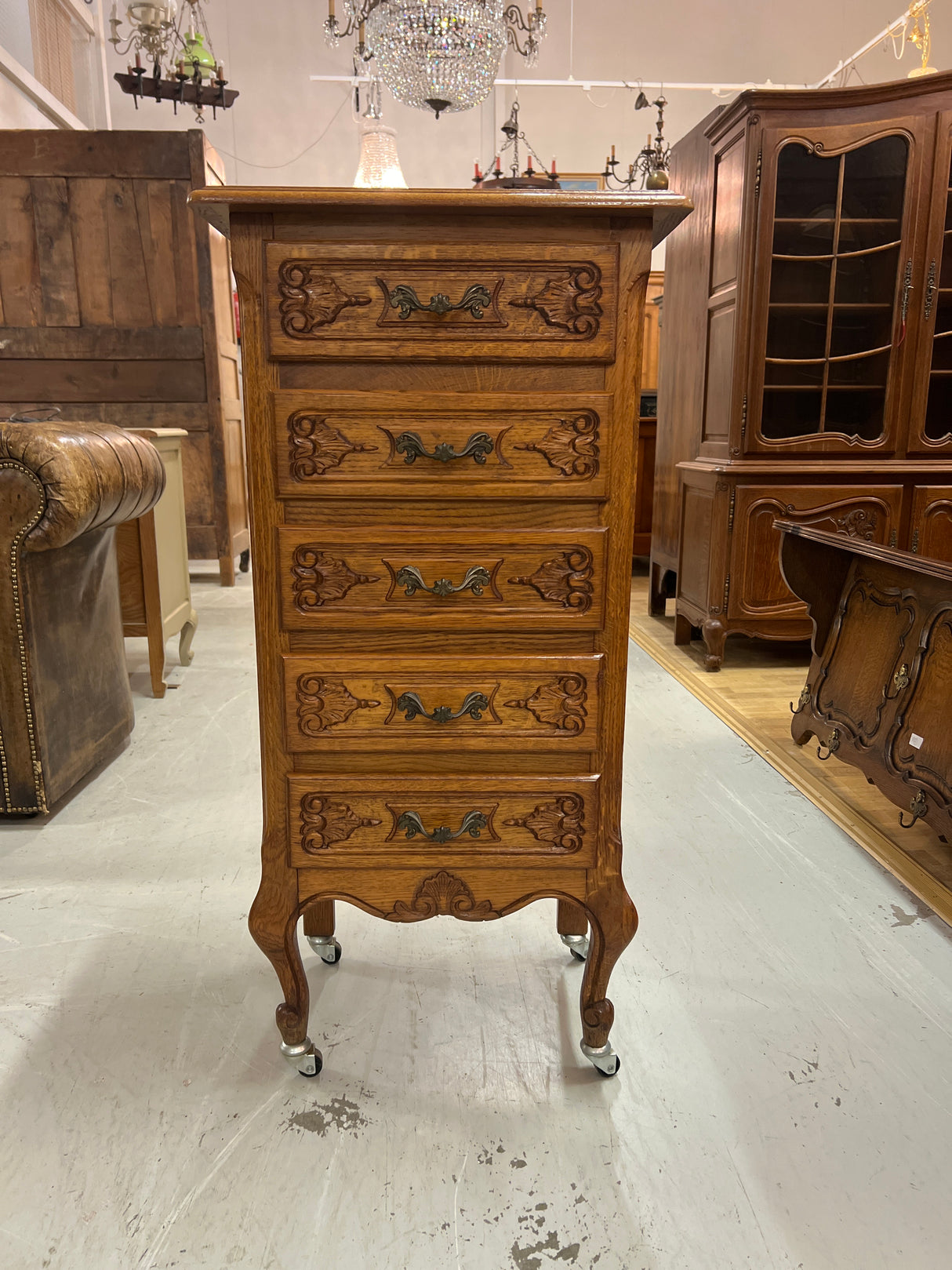 Rococo chest of drawers, W. 48cm, D. 33cm, H. 99cm (including wheels).