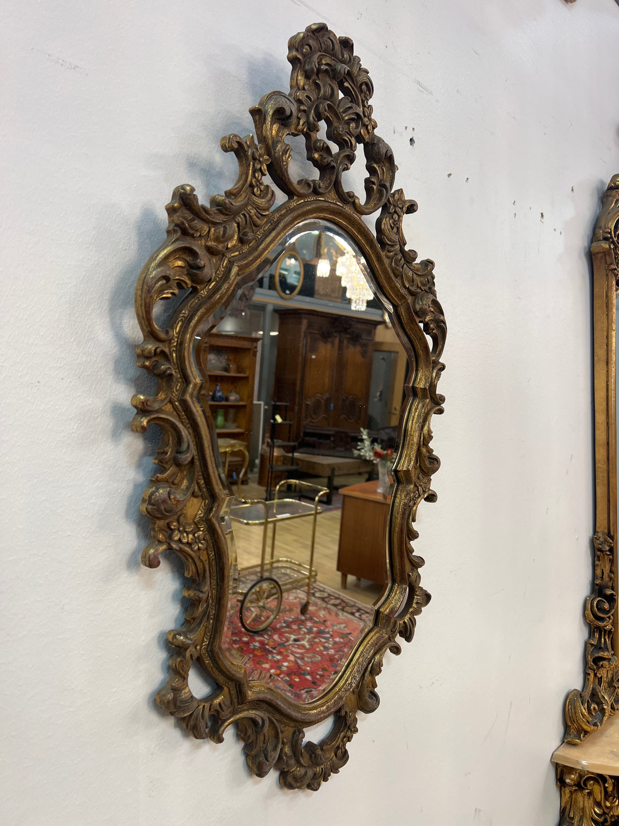 Superb rococo mirror with faceted edge L. 46.5cm and H. 81cm