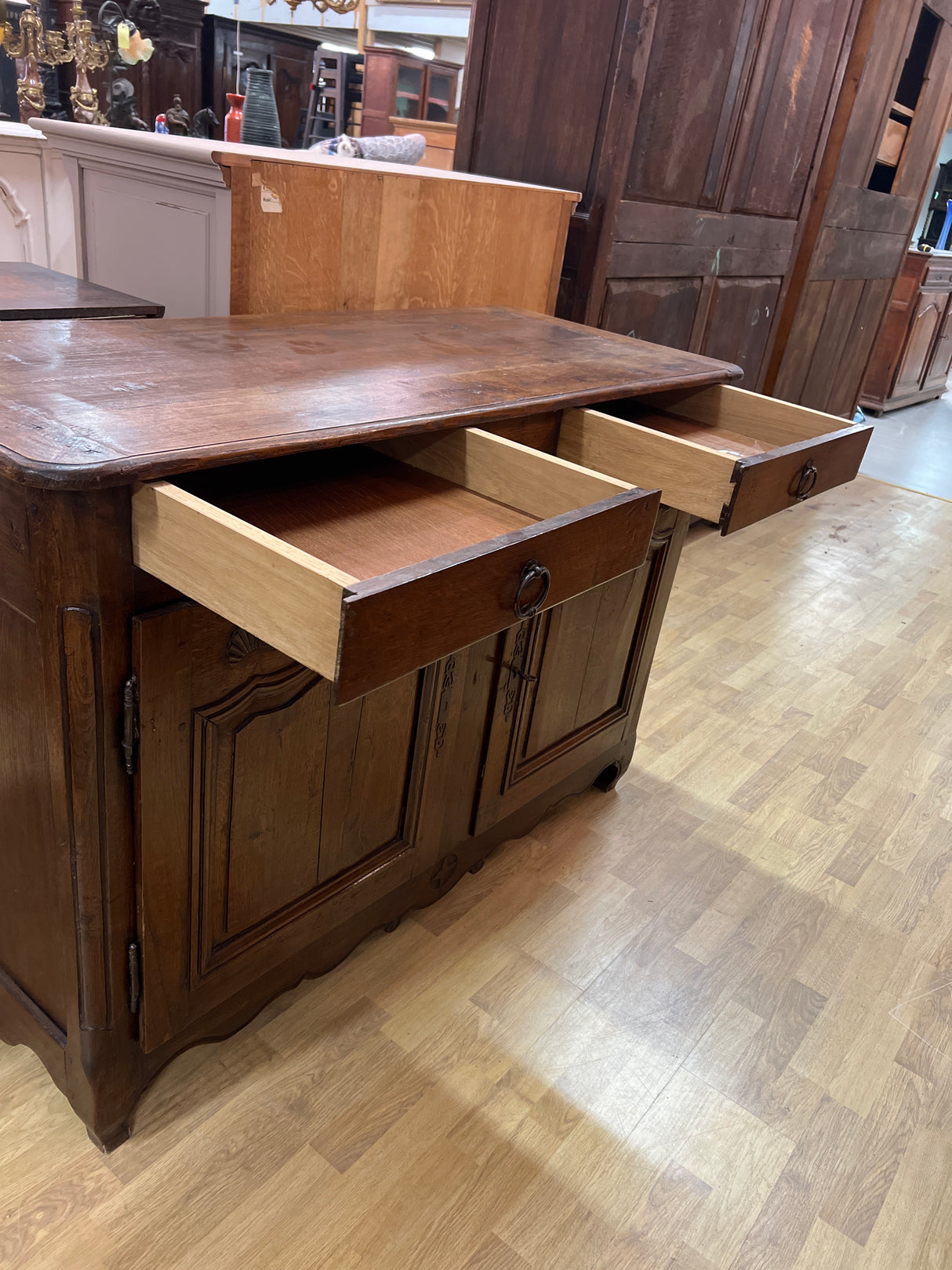 19th century hand-carved oak sideboard, W. 137cm, D. 57cm and H. 95cm.