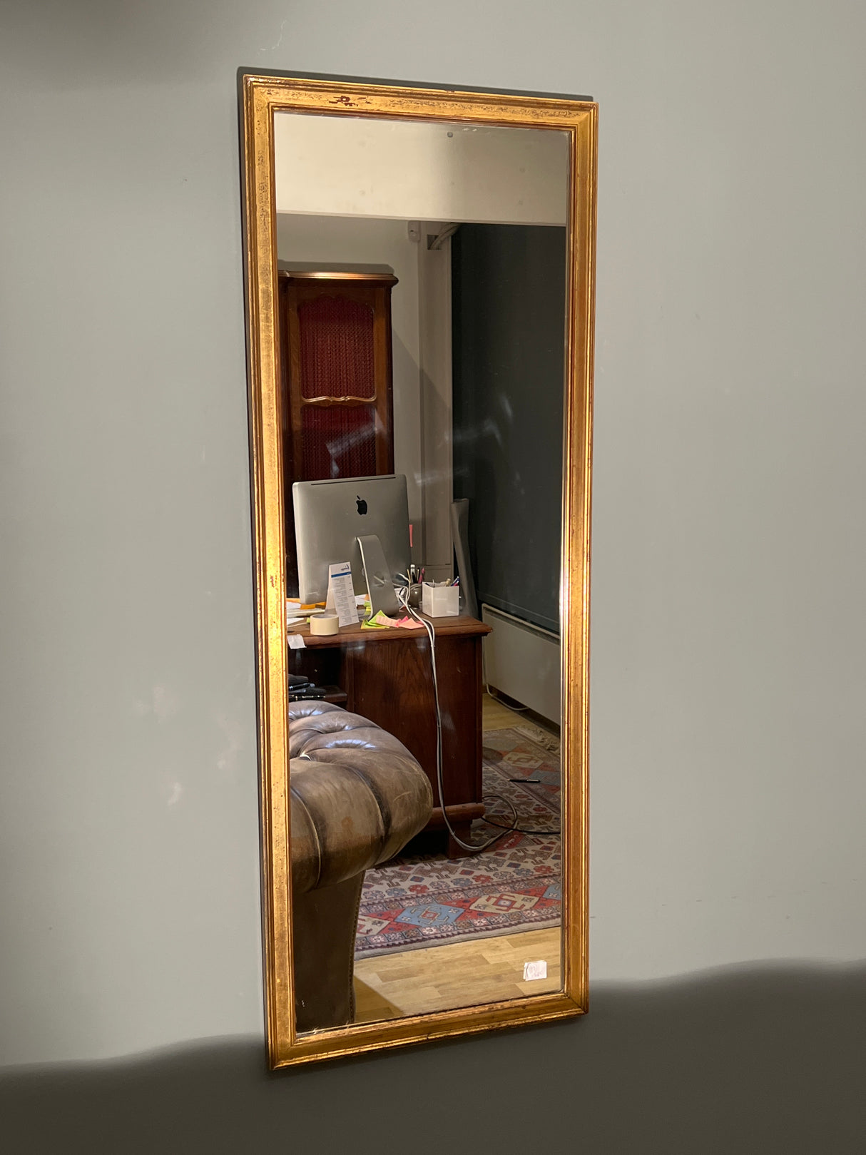Old wooden-framed, patinated mirror. 119.5cm x 44.5cm