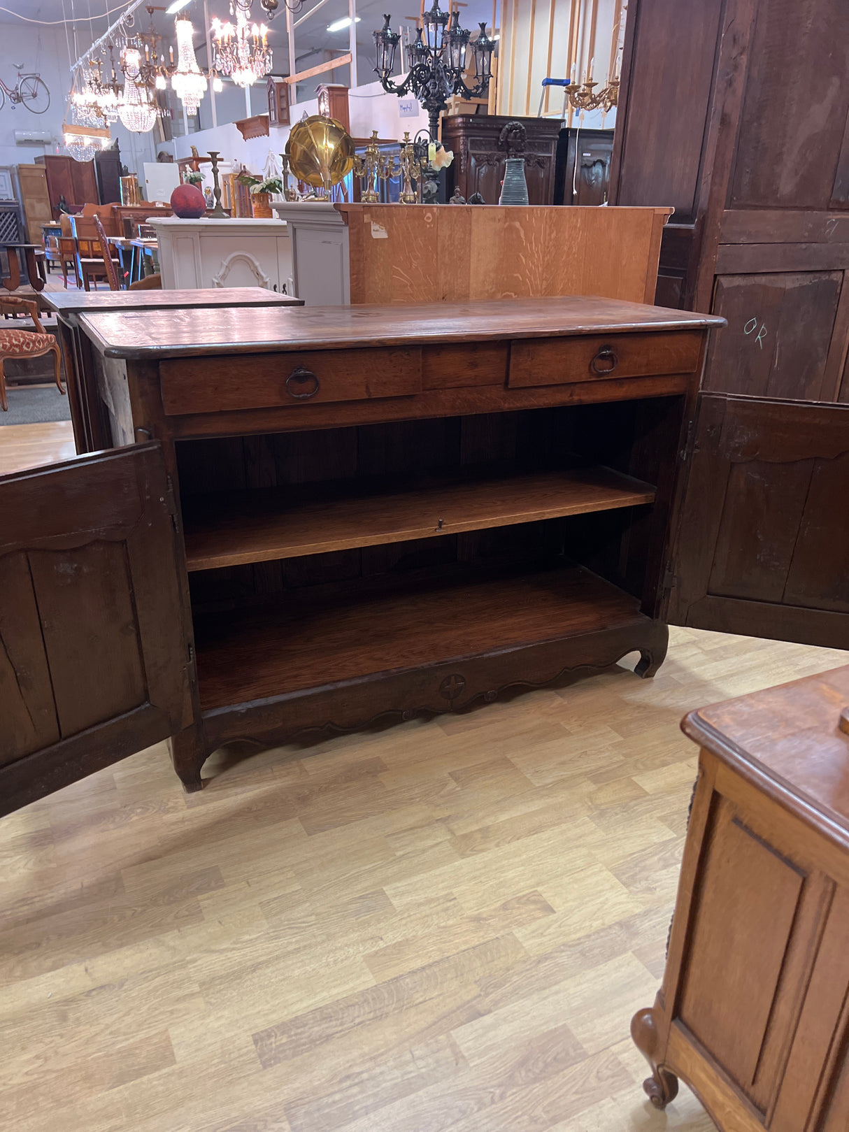 19th century hand-carved oak sideboard, W. 137cm, D. 57cm and H. 95cm.