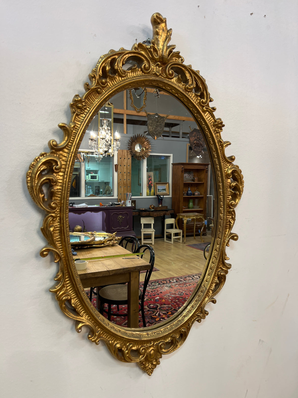 Fine gold-framed mirror L. 58cm and H. 86cm