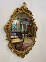 Fine gold-framed mirror L. 58cm and H. 86cm